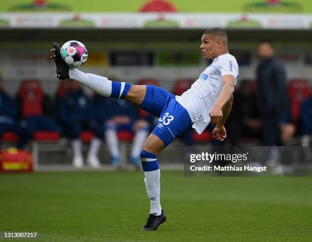 Malick Thiaw of Schalke controls the ball during the Bundesliga match between Sport-Club Freiburg and FC Schalke 04 at Schwarzwald-Stadion on April...