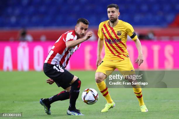 Jordi Alba of Barcelona and Alejandro Berenguer Remiro of Athletic Club compete for the ball during the Copa del Rey Final match between Athletic...