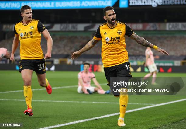 Willian Jose of Wolverhampton Wanderers celebrates after scoring his team's first goal during the Premier League match between Wolverhampton...