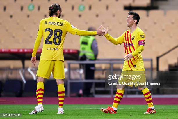 Lionel Messi and Oscar Mingueza of FC Barcelona celebrate their team's third goal during the Copa del Rey Final match between Athletic Club and...
