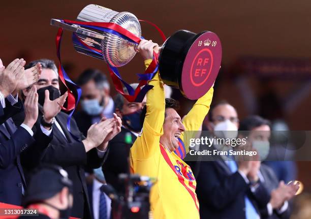 Lionel Messi of FC Barcelona lifts the trophy after winning the Copa Del Rey Final match between Athletic Club and Barcelona at Estadio de La Cartuja...