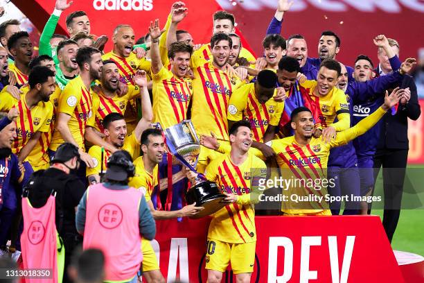 The FC Barcelona team celebrate with the trophy at the end of the Copa del Rey Final match between Athletic Club and Barcelona at Estadio de La...