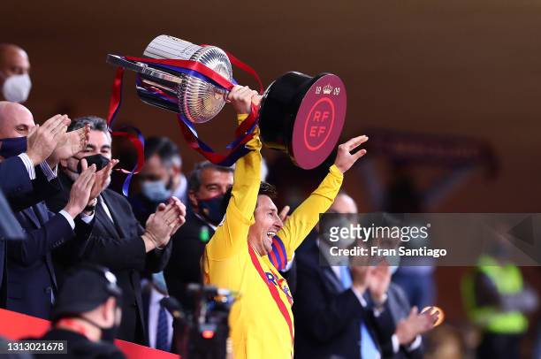 Lionel Messi of FC Barcelona lifts the trophy after winning the Copa del Rey Final match between Athletic Club and Barcelona at Estadio de La Cartuja...