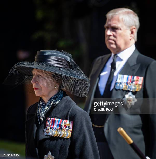Princess Anne, Princess Royal an Prince Andrew, Duke of York look on as the coffin of Prince Philip, Duke of Edinburgh is carried into St George's...