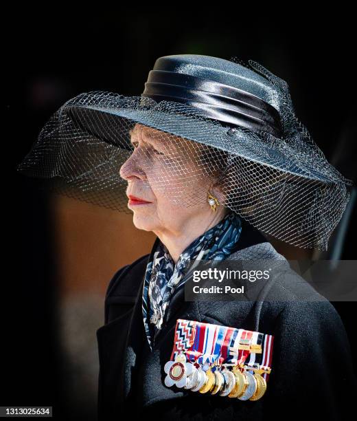 Princess Anne, Princess Royal looks on as the coffin of Prince Philip, Duke of Edinburgh arrives St George's Chapel in a purpose build Land Rover...