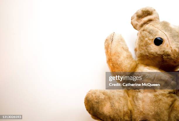 photo autopsy of a much loved teddy bear toy - old stuffed toy stock pictures, royalty-free photos & images