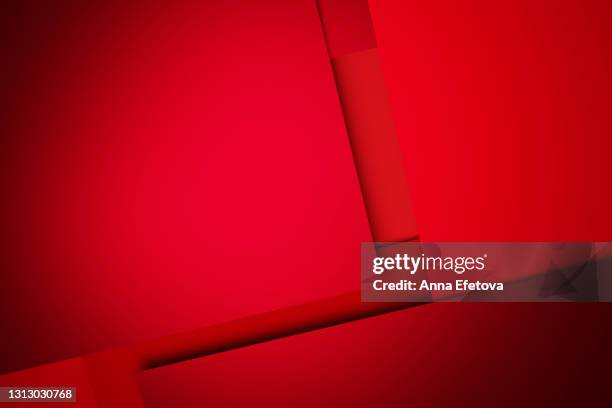 multi layered background made of red paper. flat lay style. copy space for your design. christmas celebration concept - origami background stockfoto's en -beelden