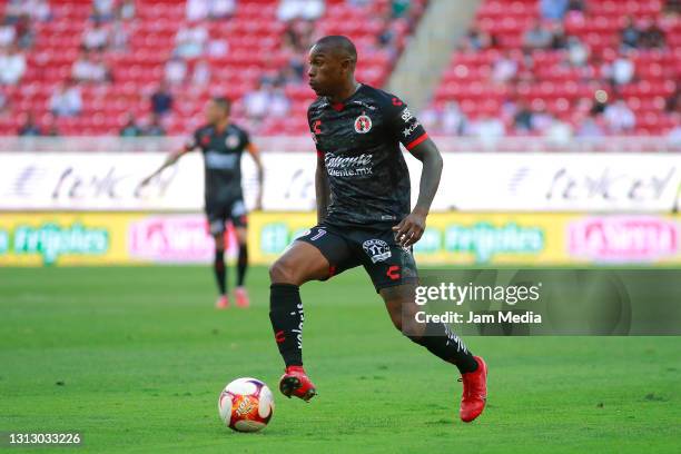 Fabian Castillo of Tijuana controls the ball during the 15th round match between Chivas and Tijuana as part of the Torneo Guard1anes 2021 Liga MX at...