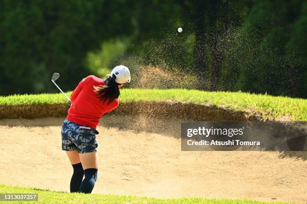 Kotone Hori of Japan hits out from a bunker on the 4th hole during the final round of the KKT Vantelin Ladies Open at the Kumamoto Kuko Country Club...