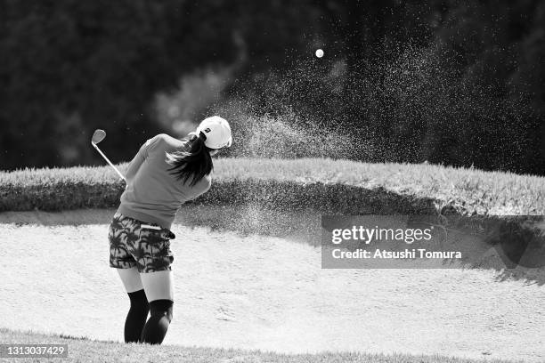 Kotone Hori of Japan hits out from a bunker on the 4th hole during the final round of the KKT Vantelin Ladies Open at the Kumamoto Kuko Country Club...