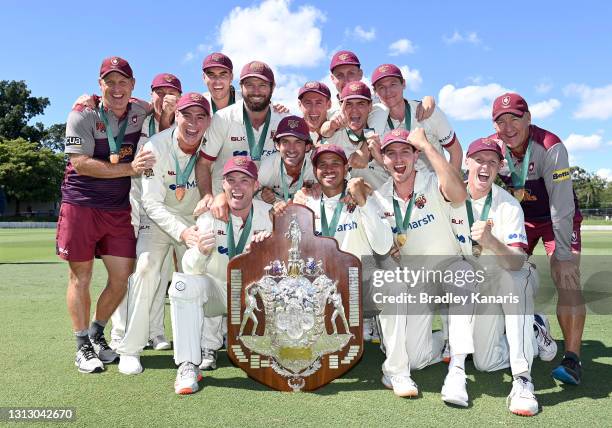 The Queensland team celebrates victory during day four of the Sheffield Shield Final match between Queensland and New South Wales at Allan Border...