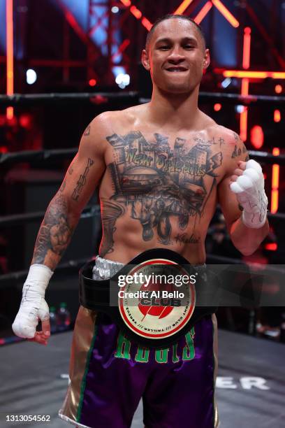 Regis Prograis celebrates after defeating Ivan Redkach by technical decision in their junior welterweight bout during Triller Fight Club at...