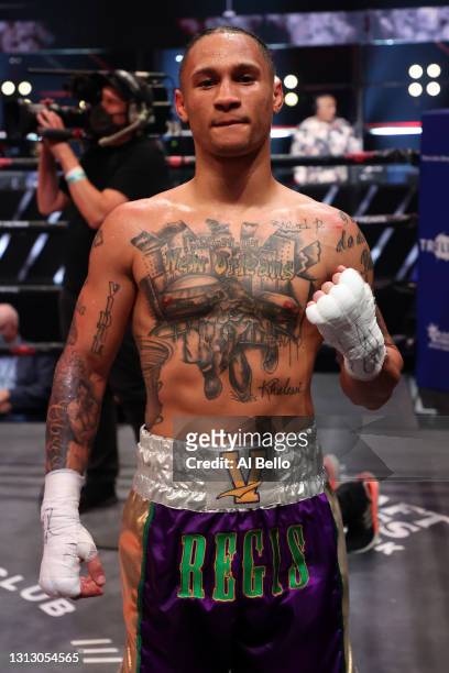 Regis Prograis celebrates after defeating Ivan Redkach by technical decision in their junior welterweight bout during Triller Fight Club at...