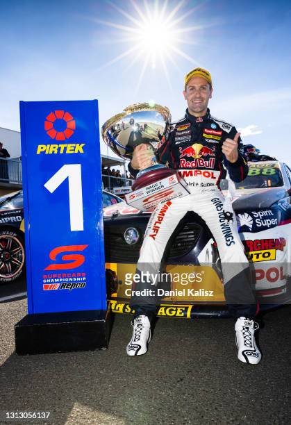 Race winner Jamie Whincup drives the Red Bull Ampol Racing Holden Commodore ZB celebrates during race 2 of the Tasmania SuperSprint which is part of...