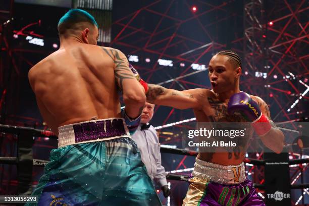 Regis Prograis punches Ivan Redkach in their junior welterweight bout during Triller Fight Club at Mercedes-Benz Stadium on April 17, 2021 in...