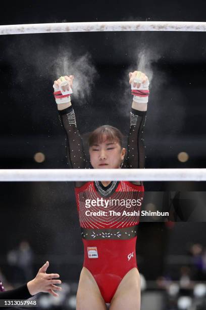 Asuka Teramoto falls while competing in the Uneven Bars competes in the yyy during the women's final on day three of the 75th All Japan Artistic...