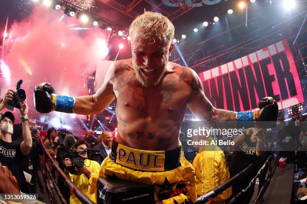 Jake Paul celebrates after defeating Ben Askren in their cruiserweight bout during Triller Fight Club at Mercedes-Benz Stadium on April 17, 2021 in...