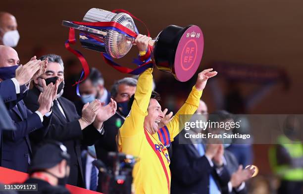 Lionel Messi of FC Barcelona lifts the trophy after winning the Copa del Rey Final match between Athletic Club and Barcelona at Estadio de La Cartuja...