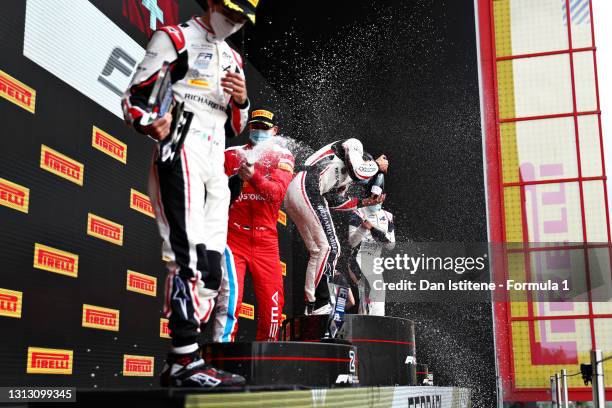 Race winner Gregoire Saucy of Switzerland and ART Grand Prix, second placed Paul Aron of Estonia and Prema Racing, third placed Zane Maloney of...