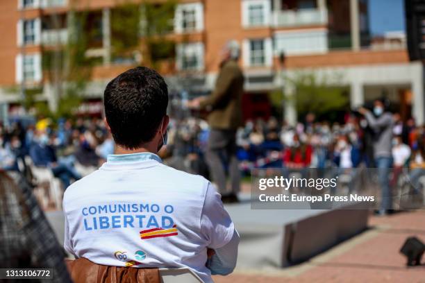 Man attends a PP election rally with a polo shirt that reads "Communism or Freedom", on April 17 in Las Rozas, Madrid . This Sunday has officially...
