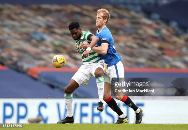 Odsonne Edouard of Celtic and Filip Helander of Rangers battle for the ball during the Scottish Cup game between Rangers and Celtic at Ibrox Stadium...