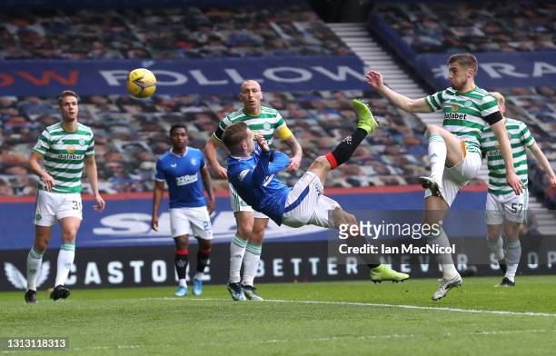 Steven Davis of Rangers scores his team's first goal during the Scottish Cup game between Rangers and Celtic at Ibrox Stadium on April 18, 2021 in...