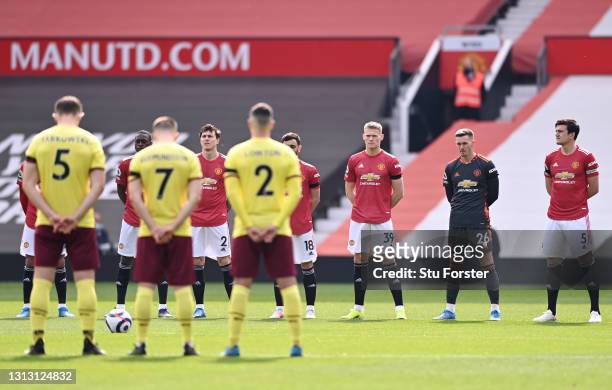 Burnley and Manchester United players observe a minute of silence in memory of Prince Philip, Duke of Edinburgh, who recently passed away prior to...