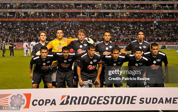 The team of Libertad of Paraguay pose for a group photo before a match as part of Bridgestone Sudamericana Cup 2011, between LDU and Libertad, at...