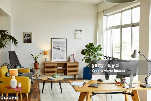 interior of modern home office - soggiorno foto e immagini stock