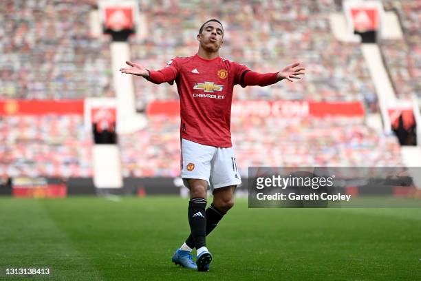 Mason Greenwood of Manchester United celebrates after scoring his team's second goal during the Premier League match between Manchester United and...