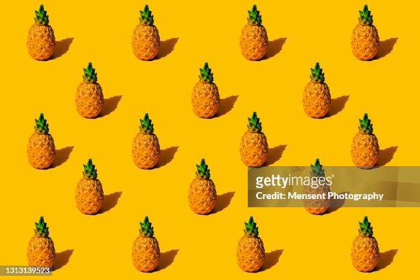 pineapple fruit pop art pattern on a yellow background - pineapple stock pictures, royalty-free photos & images