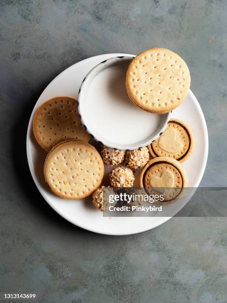 biscuit, cookies and milk, sweet biscuit, butter cookies, shortbread, biscuit with milk, - coconut biscuits stock pictures, royalty-free photos & images