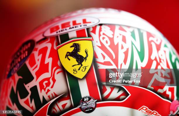 Detailed view of a Ferrari logo on the race helmet of Charles Leclerc of Monaco and Ferrari on the grid prior to the F1 Grand Prix of Emilia Romagna...