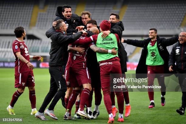 Simone Zaza of Torino F.C. Celebrates with teammates after scoring their team's second goal during the Serie A match between Torino FC and AS Roma at...