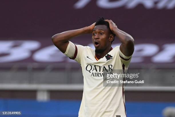 Amadou Diawara of AS Roma reacts during the Serie A match between Torino FC and AS Roma at Stadio Olimpico di Torino on April 18, 2021 in Turin,...