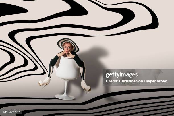 funny woman in striped leggings and hat - arte cultura e espetáculo - fotografias e filmes do acervo