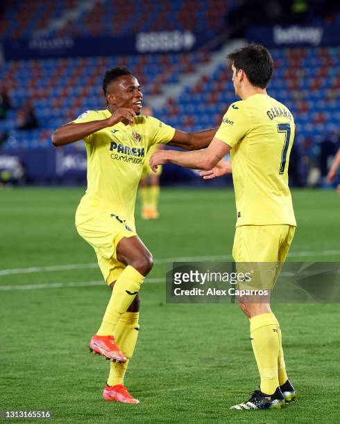 Gerard Moreno of Villarreal CF celebrates with his teammate Samuel Chukwueze after scoring his team's second goal during the La Liga Santander match...