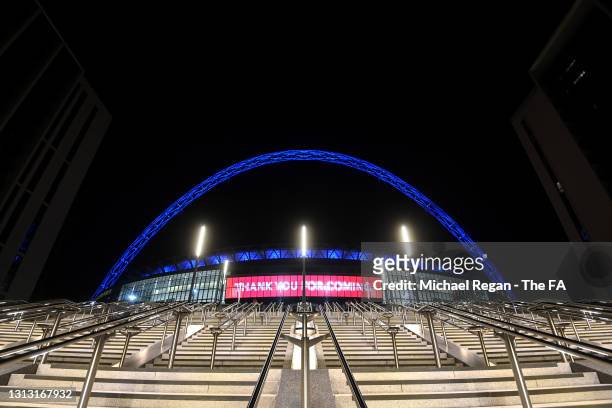 General view outside the stadium as the Wembley arch is coloured blue for Leicester City following their victory during the Semi Final of the...