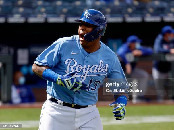 Catcher Salvador Perez of the Kansas City Royals celebrates while trotting up the first base line after hitting a home run during the bottom of the...