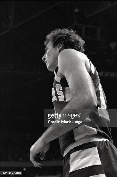 Cleveland Cavaliers guard Dick Snyder watches the game from the backcourt line in an NBA basketball game between the Denver Nuggets and the Cleveland...