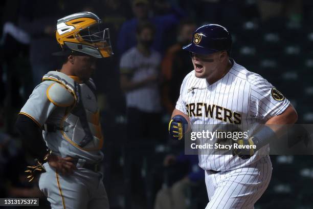 Daniel Vogelbach of the Milwaukee Brewers celebrates a two run home run during the seventh inning against the Pittsburgh Pirates at American Family...