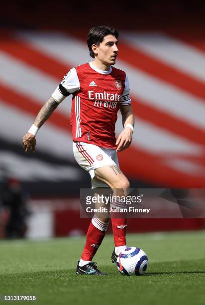 Hector Bellerin of Arsenal in action during the Premier League match between Arsenal and Fulham at Emirates Stadium on April 18, 2021 in London,...