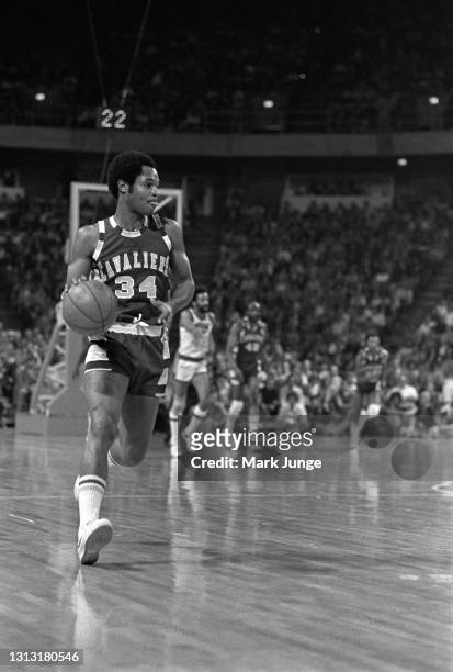 Cleveland Cavaliers guard Austin Carr dribbles in the frontcourt during an NBA basketball game against the Denver Nuggets at McNichols Arena on...