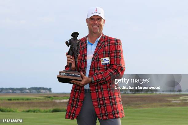 Stewart Cink of the United States poses with the trophy after winning the RBC Heritage on April 18, 2021 at Harbour Town Golf Links in Hilton Head...