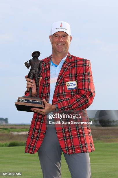 Stewart Cink of the United States poses with the trophy after winning the RBC Heritage on April 18, 2021 at Harbour Town Golf Links in Hilton Head...