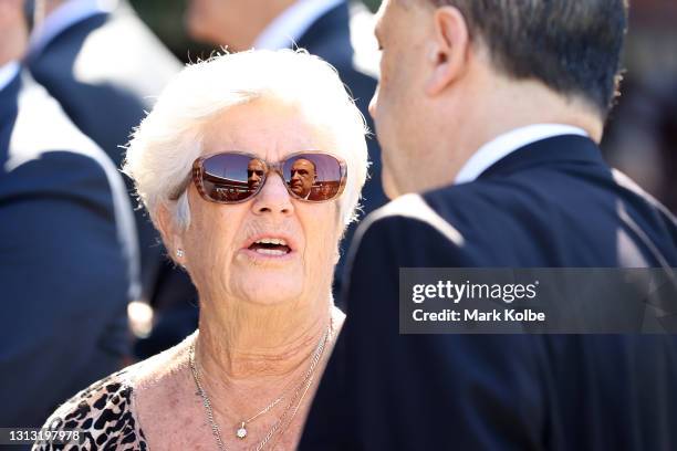 Tommy Raudonikis' wife Trish Brown speaks with Australian Rugby League Commission Chairman Peter V'landys during the Tommy Raudonikis Memorial...