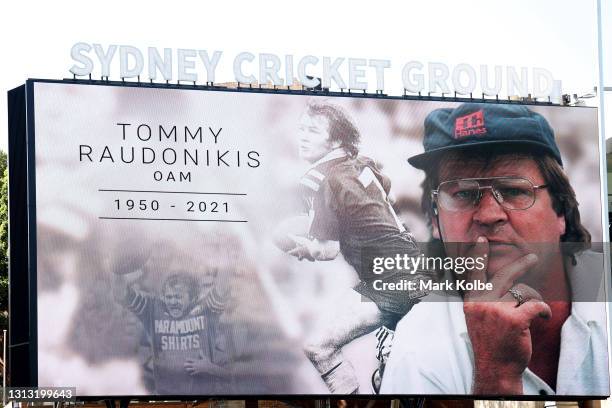 Photo Tommy Raudonikis is displayed on the big screen during the Tommy Raudonikis Memorial Service at the Sydney Cricket Ground on April 19, 2021 in...