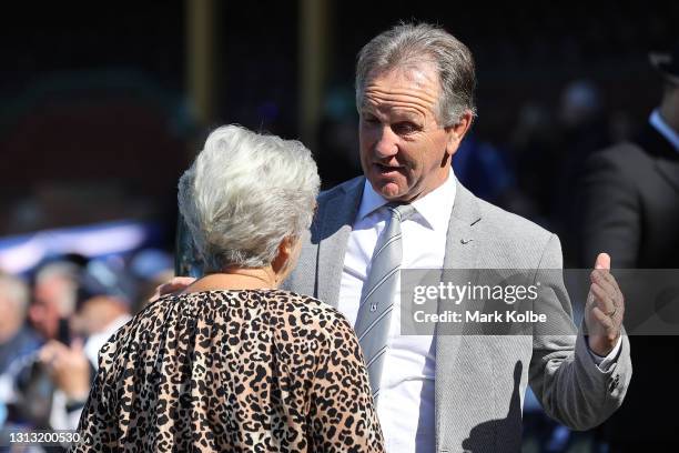 Former rugby league player John Dorahy speaks to Tommy Raudonikis' wife Trish Brown during the Tommy Raudonikis Memorial Service at the Sydney...