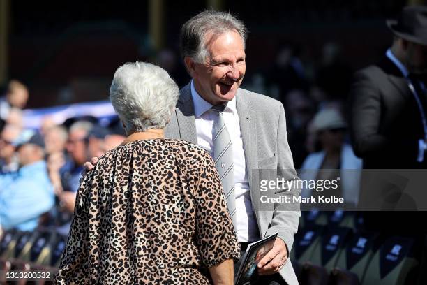 Former rugby league player John Dorahy speaks to Tommy Raudonikis' wife Trish Brown during the Tommy Raudonikis Memorial Service at the Sydney...