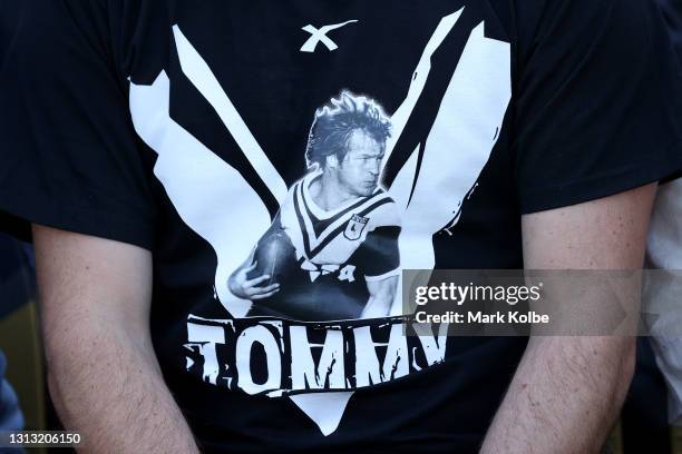 Spectator is seen wearing a Tommy Raudonikis t-shirt during the Tommy Raudonikis Memorial Service at the Sydney Cricket Ground on April 19, 2021 in...